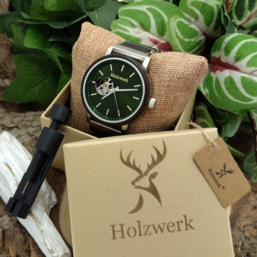 Holzwerk CREUSSEN Automatik-Uhr mit silber-braunem Gehäuse und grün-silbernem Ziffernblatt, mit offener Unruhe in Holzwerk Verpackung