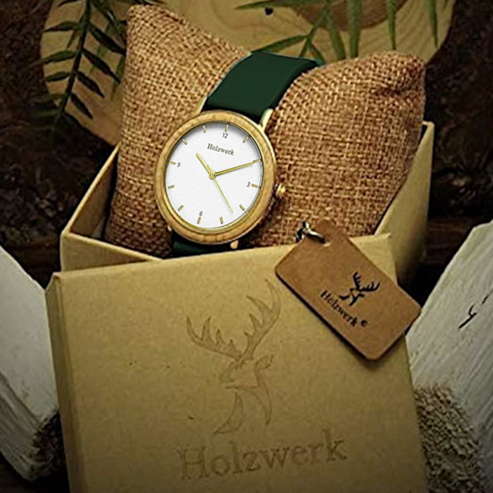 Holzwerk JENA Damenuhr in Gold und Braun sowie weiß-goldenem Ziffernblatt und grünem Lederarmband in Holzwerk Verpackung