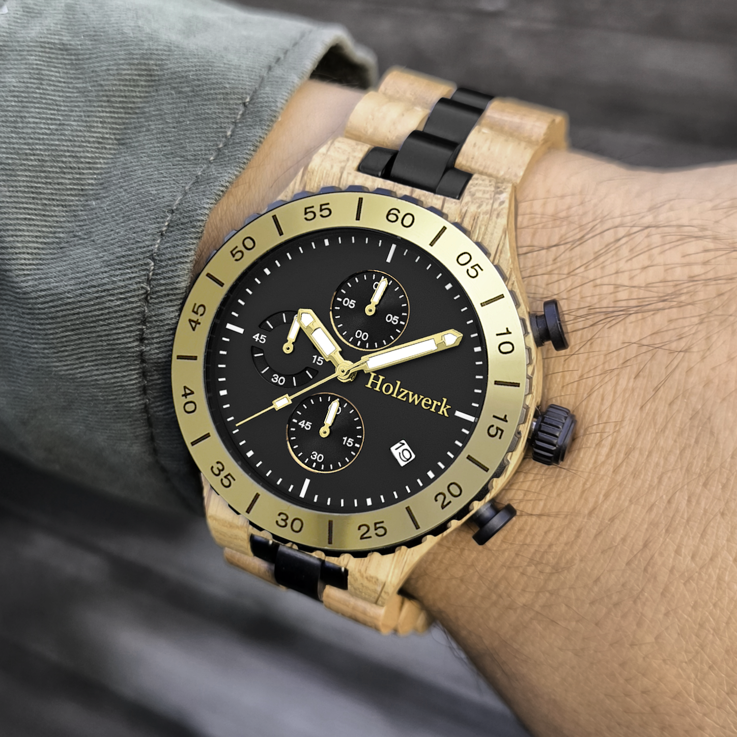 Holzwerk HAMELN Chronographen-Uhr aus Oliven-Holz mit Chronographen, Datum und schwarz-goldenem Ziffernblatt am Handgelenk