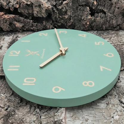 Holzwerk LIMBURG 25 cm moderne Holz-Funk Wanduhr in mintgrün aus Vollholz mit Metallzeigern, Seitenansicht links